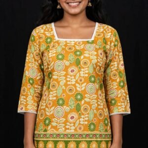Mustard Yellow Floral Printed Cotton Short Kurti with Green Border & Lace Work